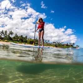 a person that is standing in the water