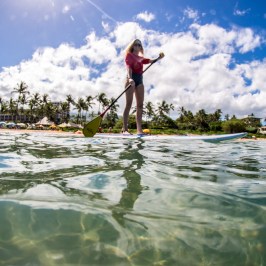 woman on stand up paddle board